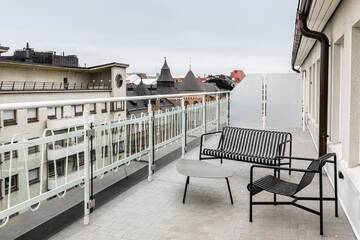 Фото номера Полулюкс «Арктик» в пентхаусе с террасой Отель Lapland Hotels Bulevardi г. Хельсинки 3
