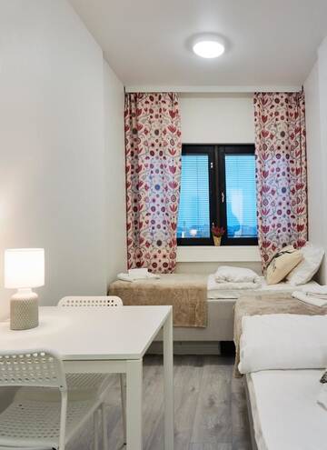 Фото номера Двухместный номер с 2 отдельными кроватями Хостелы Inn Tourist Hotel &amp; Hostel г. Хельсинки 2