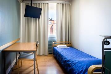 Фото номера Стандартный одноместный номер с общей ванной комнатой Хостелы Eurohostel г. Хельсинки 2