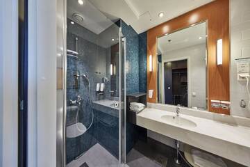 Фото номера Двухместный номер с 2 отдельными кроватями Отель Holiday Inn Helsinki West - Ruoholahti г. Хельсинки 12
