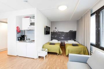 Фото номера Четырехместный номер Апарт-отели Forenom Aparthotel Helsinki Herttoniemi г. Хельсинки 7