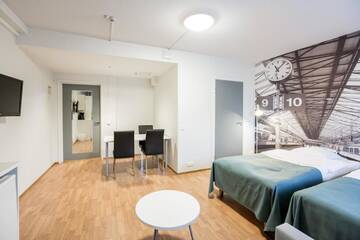 Фото номера Стандартный трехместный номер Апарт-отели Forenom Aparthotel Helsinki Herttoniemi г. Хельсинки 2