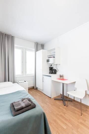 Фото номера Стандартный одноместный номер Апарт-отели Forenom Aparthotel Helsinki Herttoniemi г. Хельсинки 6