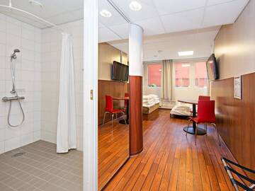 Фото номера Семейный номер Отель Omena Hotel Helsinki City Centre г. Хельсинки 4