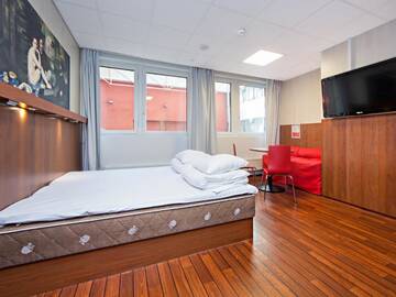 Фото номера Двухместный номер с 1 кроватью Отель Omena Hotel Helsinki City Centre г. Хельсинки 10