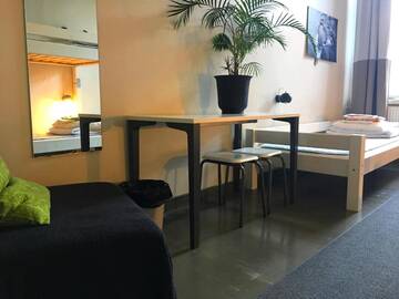 Фото номера Четырехместный номер с общей ванной комнатой Хостелы Hostel Suomenlinna г. Хельсинки 2