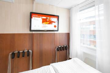 Фото номера Семейный номер Отель Omena Hotel Helsinki Lönnrotinkatu г. Хельсинки 17