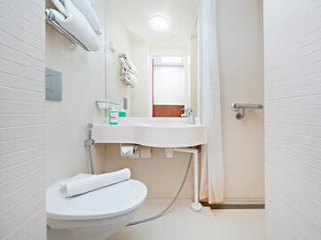 Фото номера Семейный номер Отель Omena Hotel Helsinki Lönnrotinkatu г. Хельсинки 23