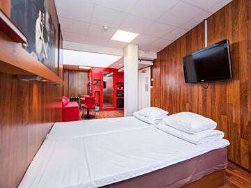Фото номера Семейный номер Отель Omena Hotel Helsinki Lönnrotinkatu г. Хельсинки 20
