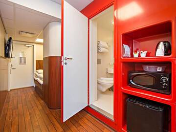 Фото номера Семейный номер Отель Omena Hotel Helsinki Lönnrotinkatu г. Хельсинки 22