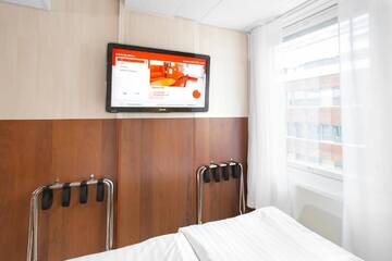 Фото номера Семейный номер Отель Omena Hotel Helsinki Lönnrotinkatu г. Хельсинки 4