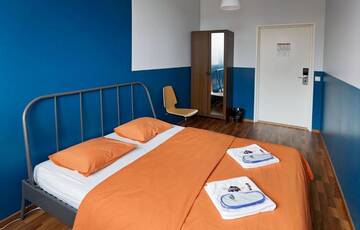 Фото номера Двухместный номер с 1 кроватью и общей ванной комнатой Хостелы CheapSleep Hostel Helsinki г. Хельсинки 2