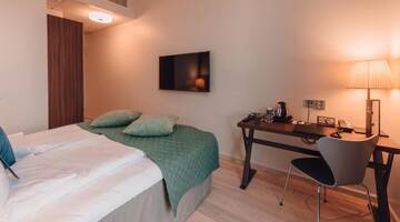 Фото номера Стандартный двухместный номер с 1 кроватью Отель Clarion Hotel Helsinki г. Хельсинки 10
