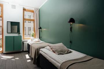 Фото номера Четырехместный номер с общей ванной комнатой Хостелы The Yard Hostel г. Хельсинки 4