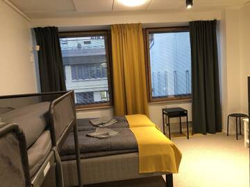 Фото номера Отдельный семейный номер с общей ванной комнатой Хостелы Aikatalo Mini Hotel Helsinki City Center г. Хельсинки 2