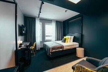 Фото номера Стандартный одноместный номер Отель The Folks Hotel Konepaja г. Хельсинки 5