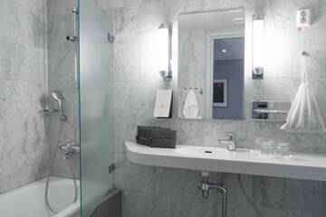 Фото номера Двухместный номер с 2 отдельными кроватями Отель Original Sokos Hotel Vaakuna Helsinki г. Хельсинки 8