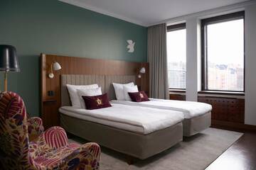 Фото номера Двухместный номер с 2 отдельными кроватями Отель Original Sokos Hotel Vaakuna Helsinki г. Хельсинки 6