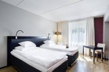 Фото номера Двухместный номер «Комфорт» GLO с 2 отдельными кроватями Отель GLO Hotel Art г. Хельсинки 5