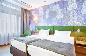 Фото номера Стандартный двухместный номер с 2 отдельными кроватями Отель Holiday Inn Helsinki City Centre г. Хельсинки 3