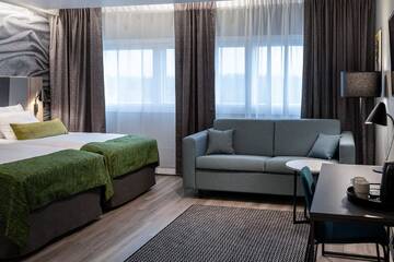 Фото номера Улучшенный семейный номер Отель Scandic Pasila г. Хельсинки 6