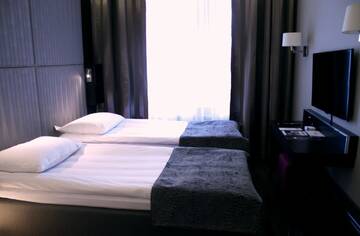 Фото номера Двухместный номер с 1 кроватью Отель GLO Hotel Kluuvi г. Хельсинки 2