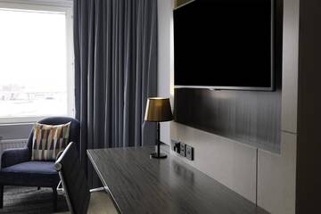 Фото номера Двухместный номер &quot;Плюс&quot; с 2 отдельными кроватями Отель Hilton Helsinki Strand г. Хельсинки 6