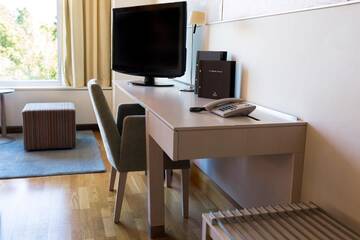 Фото номера Двухместный номер с 2 отдельными кроватями Отель Hilton Helsinki Kalastajatorppa г. Хельсинки 3