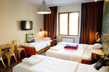 Фото номера Стандартный четырехместный номер Отель Hotel Finn г. Хельсинки 7