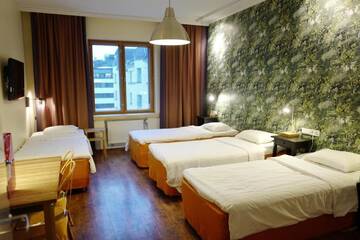 Фото номера Стандартный четырехместный номер Отель Hotel Finn г. Хельсинки 2