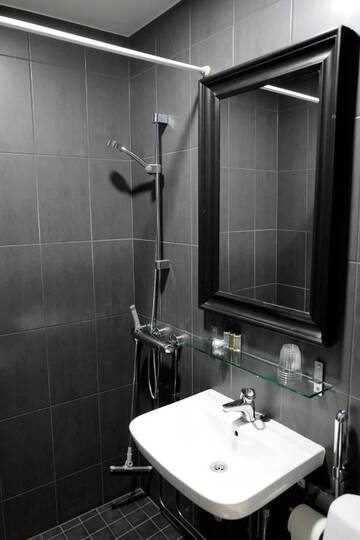 Фото номера Стандартный трехместный номер Отель Hotel Finn г. Хельсинки 11