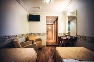 Фото номера Двухместный номер бизнес-класса с 2 отдельными кроватями Отель Hotel Arthur г. Хельсинки 4